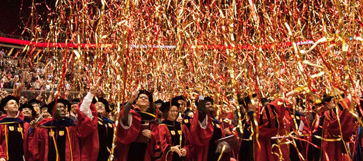 students and streamers at commencement